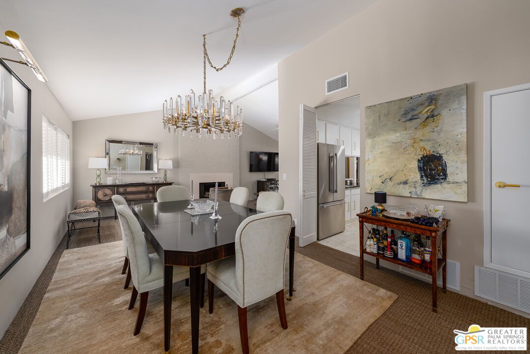 Chandelier, Dining room, Fireplace, Interior, Kitchen, Pendant Lights, Stainless Steel Appliances