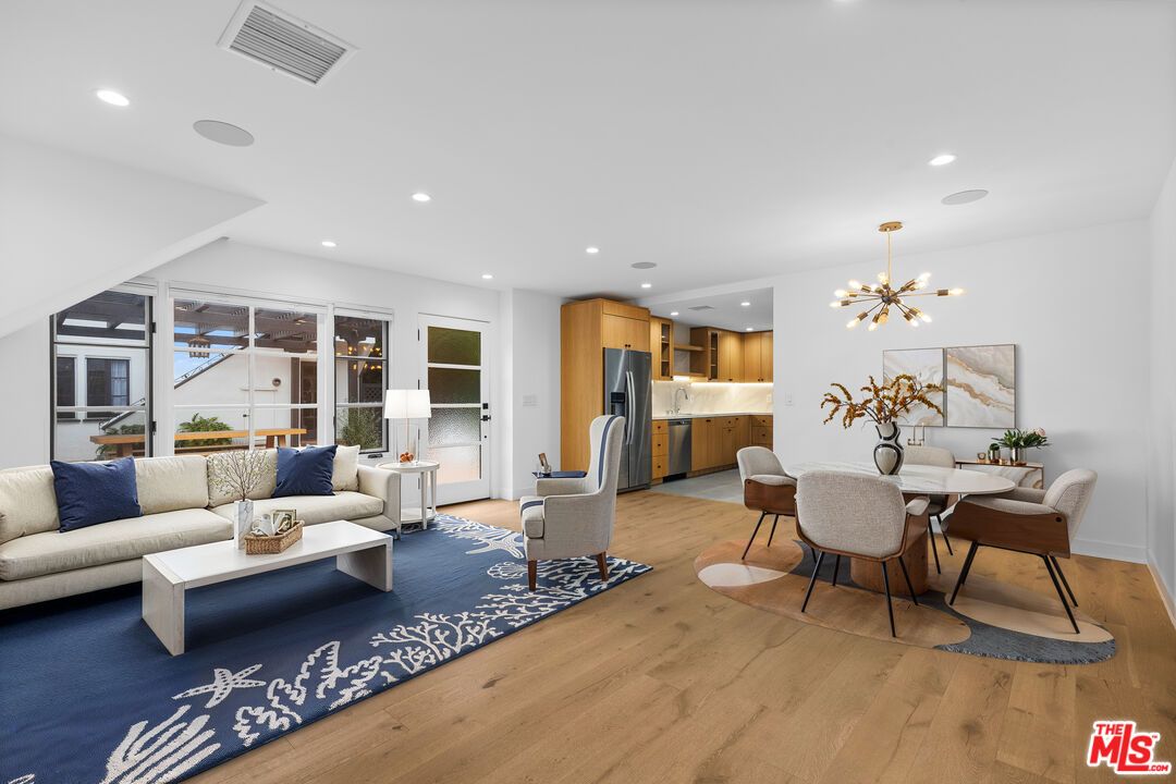 Dining room, Interior, Kitchen, Living room, Pendant Lights, Recessed Lighting, Stainless Steel Appliances, Wood Texture Flooring