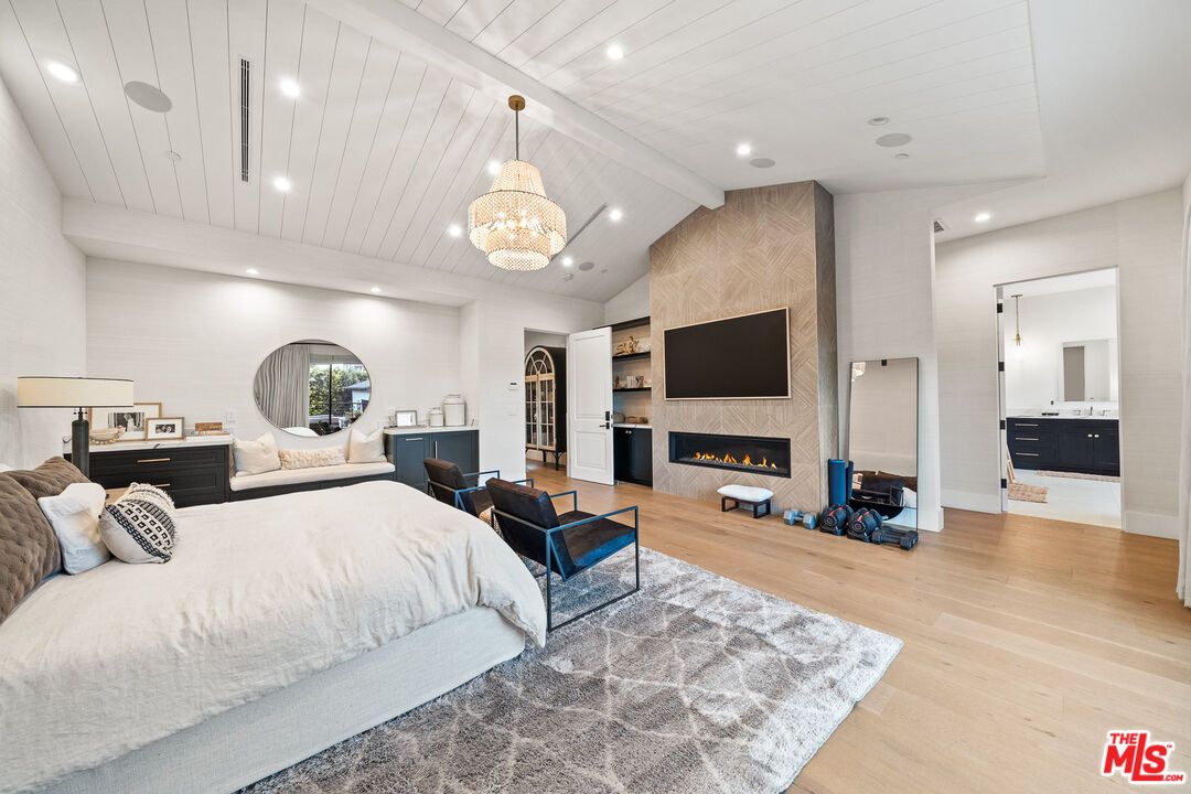 Bedroom, Chandelier, Fireplace, Interior, Pendant Lights, Recessed Lighting, Wood Texture Flooring