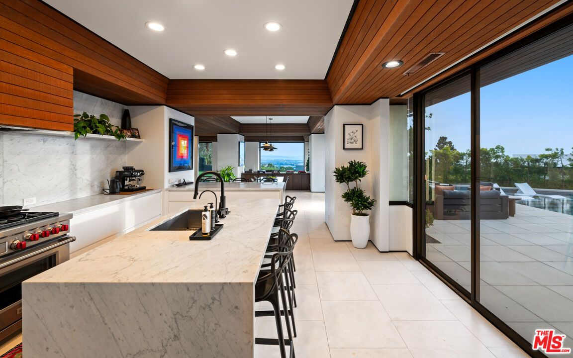 Interior, Kitchen, Marble Walls, Recessed Lighting, Stainless Steel Appliances, Water, Wooden Ceilings