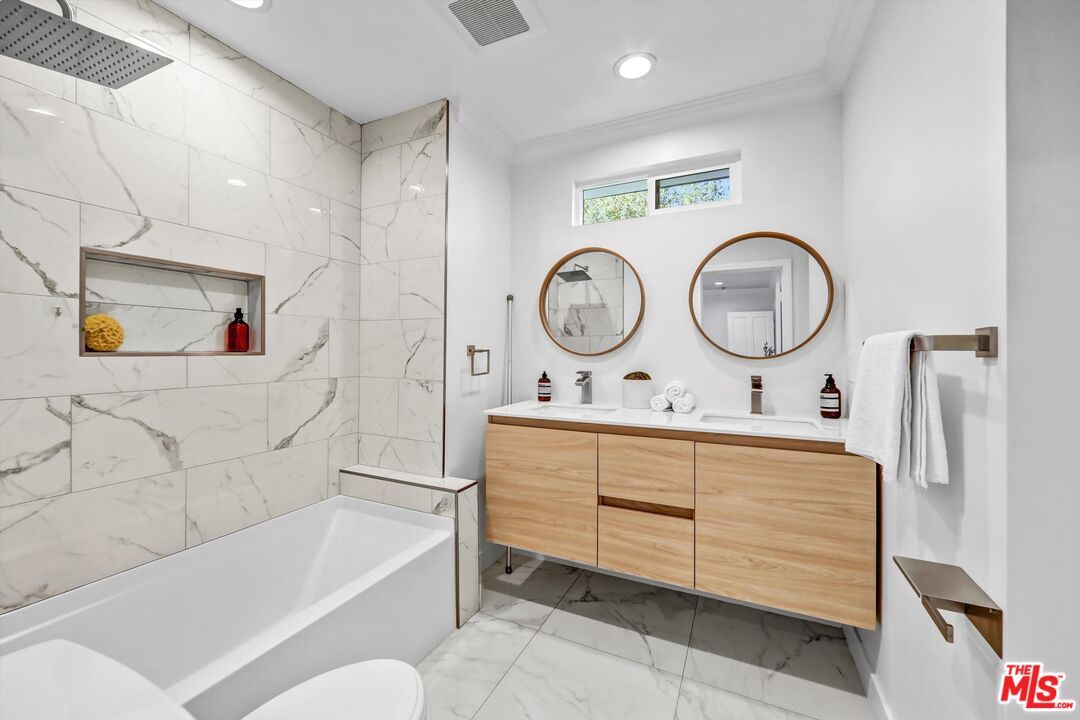 Bathroom, Dual Sink Vanities, Interior, Marble, Marble Walls, Recessed Lighting