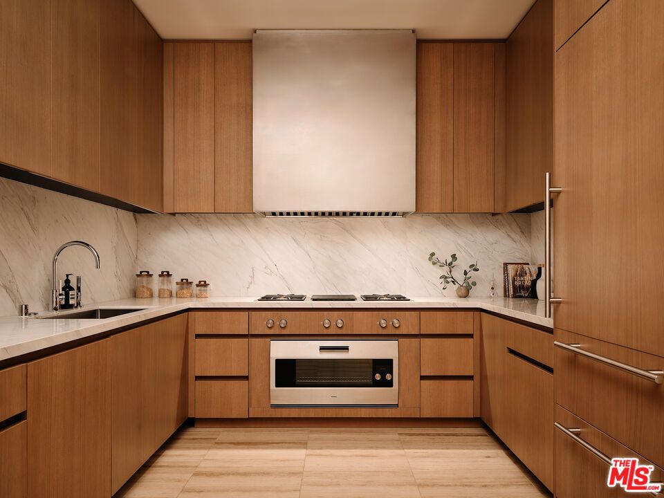 Interior, Kitchen, Marble Walls, Stainless Steel Appliances, Wood Texture Flooring