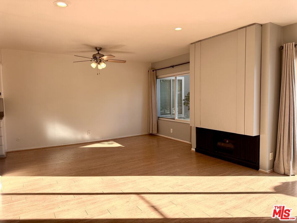 Empty room, Fireplace, Interior, Recessed Lighting, Wood Texture Flooring