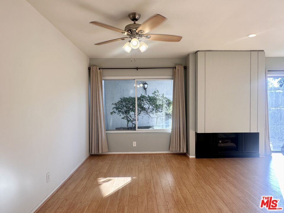 Empty room, Fireplace, Interior, Recessed Lighting, Wood Texture Flooring