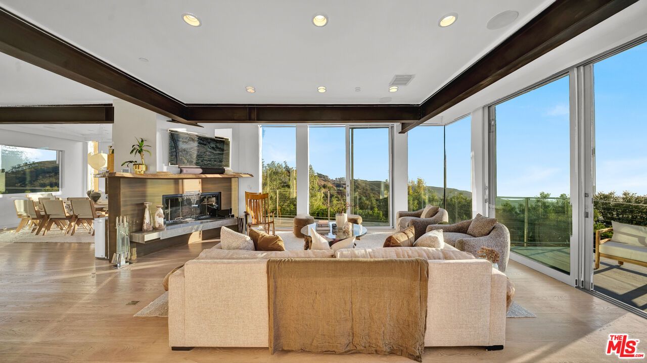 Dining room, Fireplace, Interior, Living room, Recessed Lighting, Wood Texture Flooring