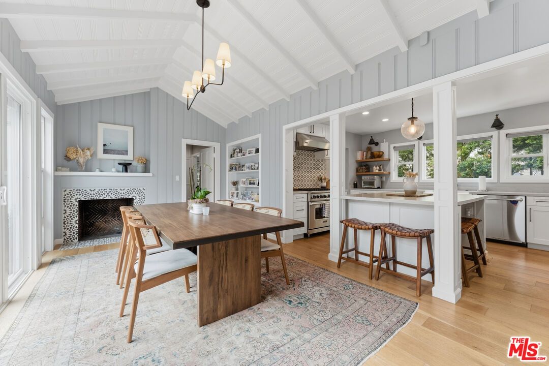 Dining room, Fireplace, Interior, Kitchen, Pendant Lights, Recessed Lighting, Stainless Steel Appliances, Wood Texture Flooring