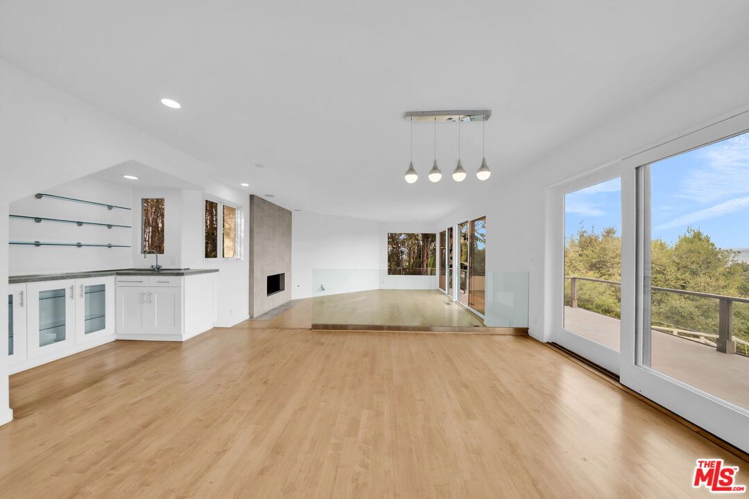 Empty room, Fireplace, Interior, Pendant Lights, Recessed Lighting, Wood Texture Flooring