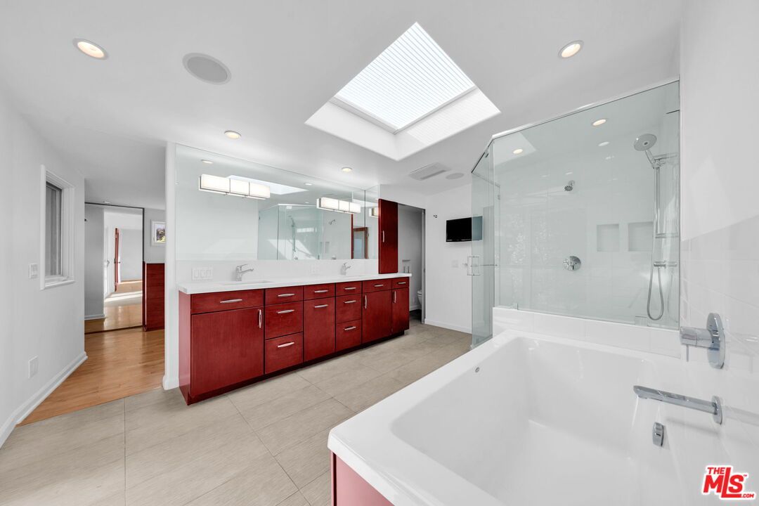 Bathroom, Dual Sink Vanities, Glass Shower, Interior, Recessed Lighting, Wood Texture Flooring