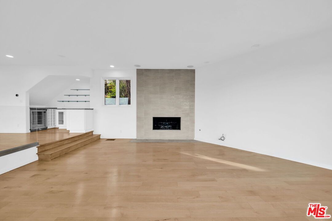 Empty room, Fireplace, Interior, Recessed Lighting, Wood Texture Flooring