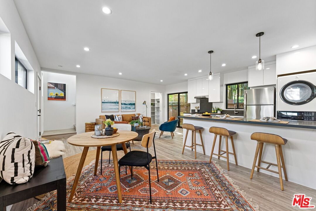 Dining room, Interior, Kitchen, Pendant Lights, Recessed Lighting, Stainless Steel Appliances, Wood Texture Flooring