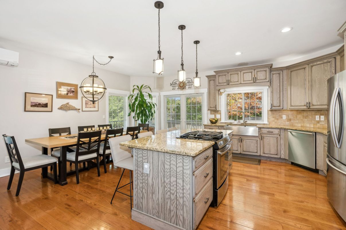 Dining room, Interior, Kitchen, Pendant Lights, Recessed Lighting, Stainless Steel Appliances, Wood Texture Flooring
