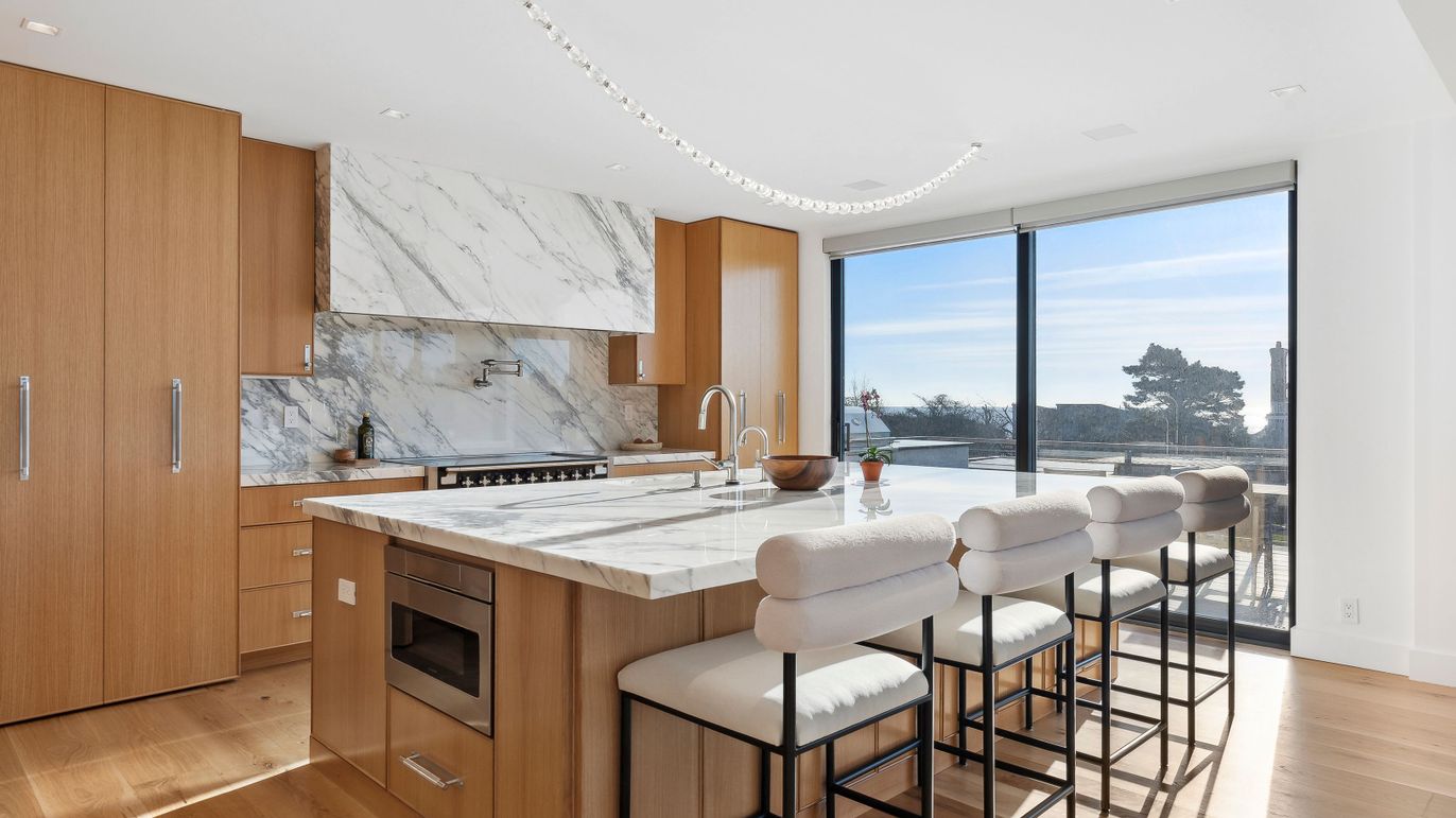 Interior, Kitchen, Marble Walls, Recessed Lighting, Stainless Steel Appliances, Wood Texture Flooring