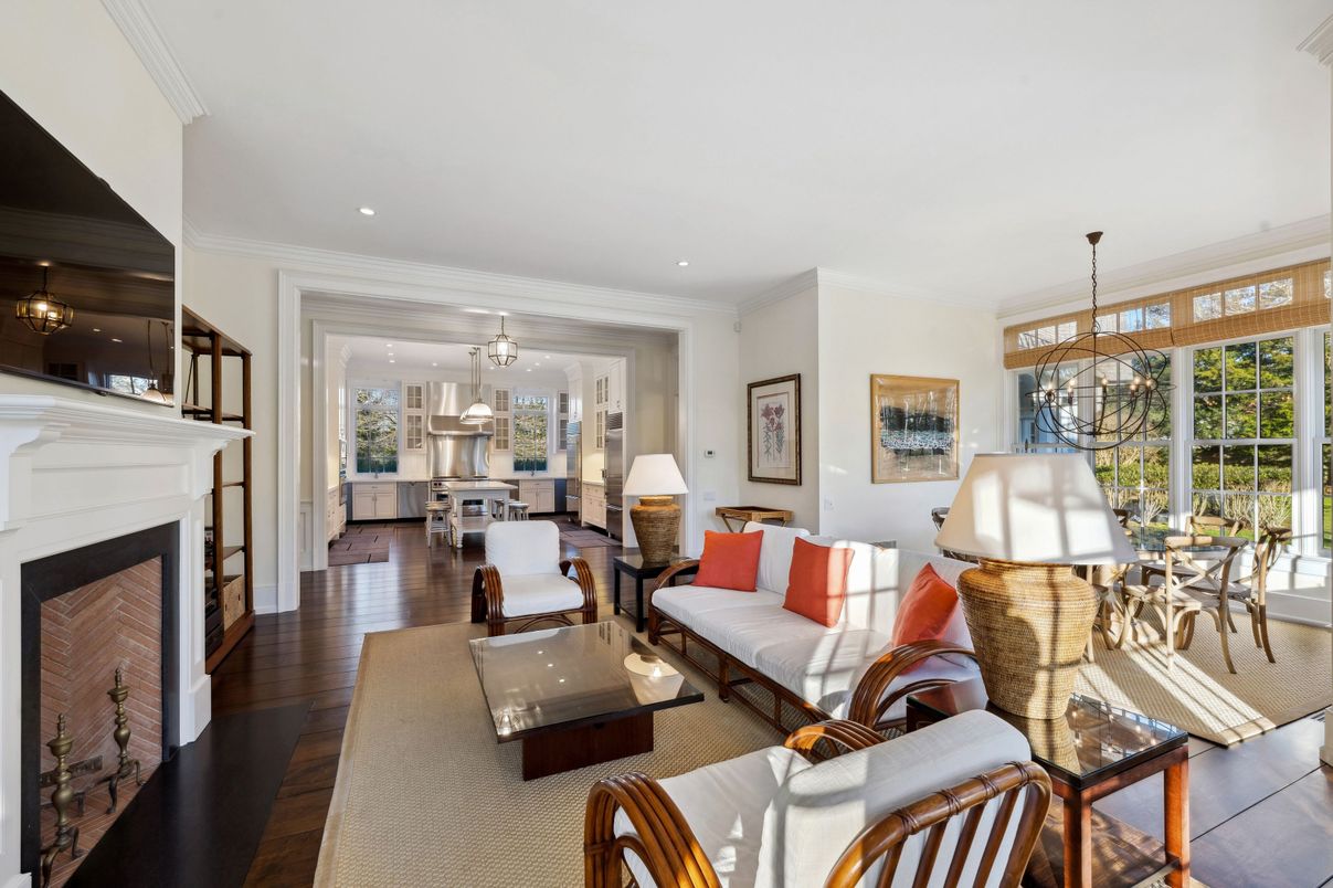 Dining room, Fireplace, Interior, Living room, Pendant Lights, Recessed Lighting, Wood Texture Flooring