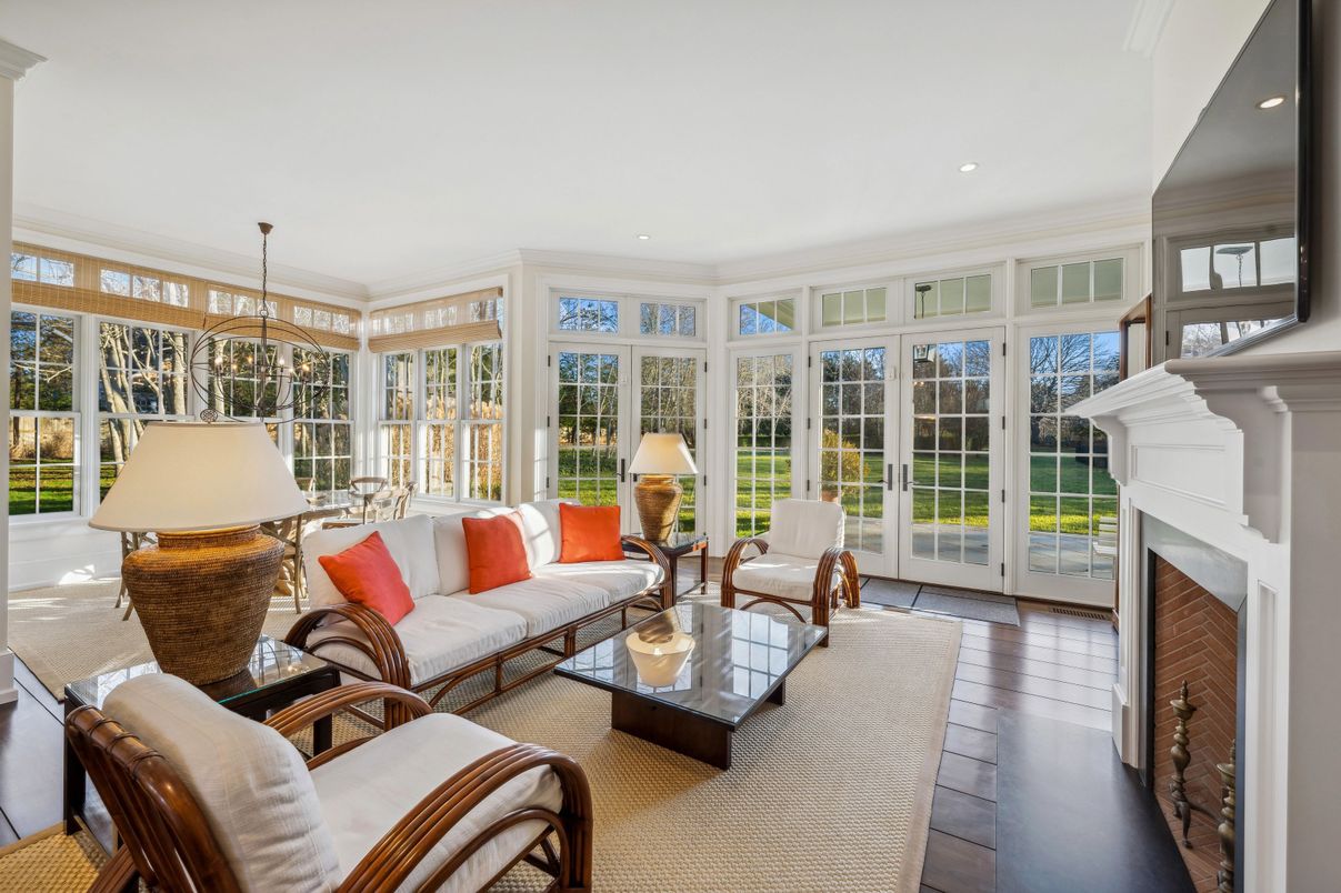 Fireplace, Interior, Living room, Recessed Lighting, Sun Room, Wood Texture Flooring