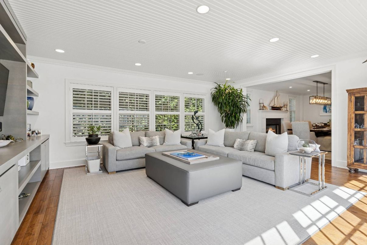 Dining room, Fireplace, Interior, Living room, Pendant Lights, Recessed Lighting, Wood Texture Flooring