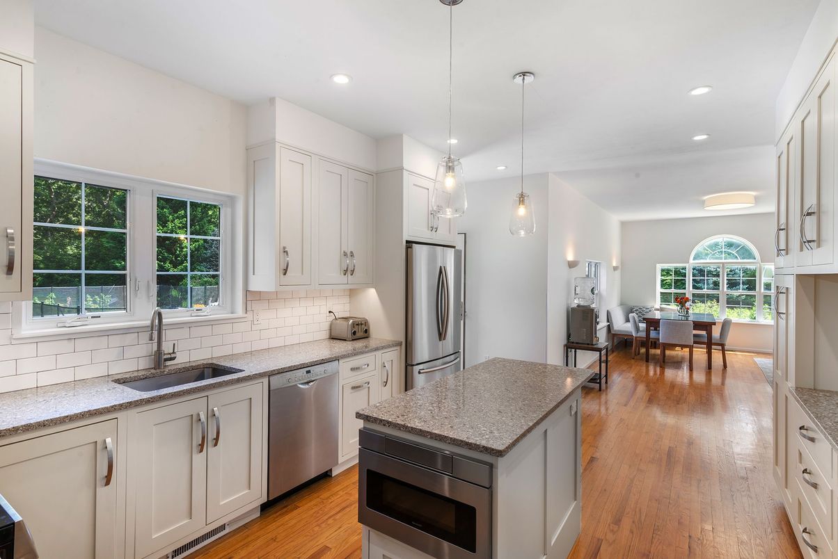 Dining room, Interior, Kitchen, Pendant Lights, Recessed Lighting, Stainless Steel Appliances, Wood Texture Flooring