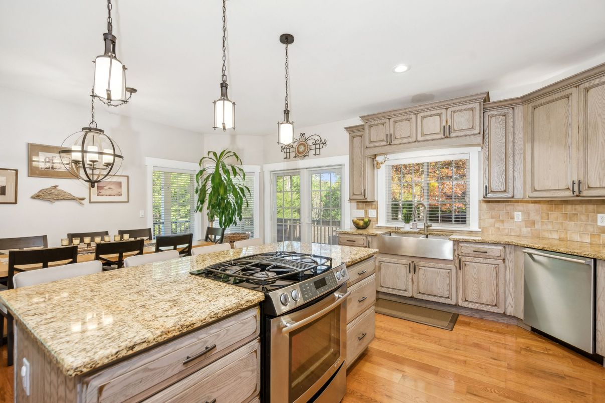 Dining room, Interior, Kitchen, Pendant Lights, Recessed Lighting, Stainless Steel Appliances, Wood Texture Flooring