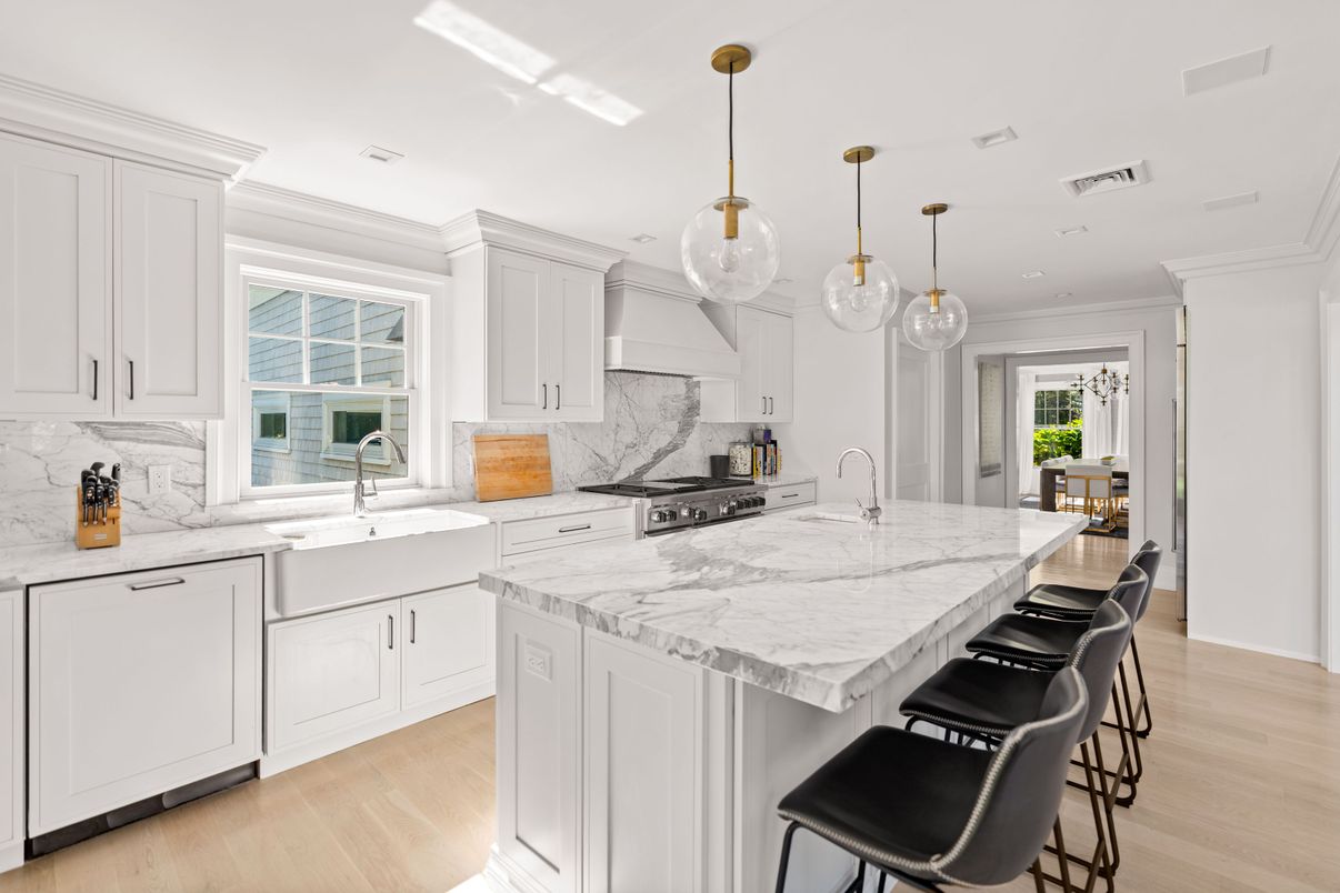 Interior, Kitchen, Marble Walls, Pendant Lights, Recessed Lighting, Stainless Steel Appliances, Wood Texture Flooring