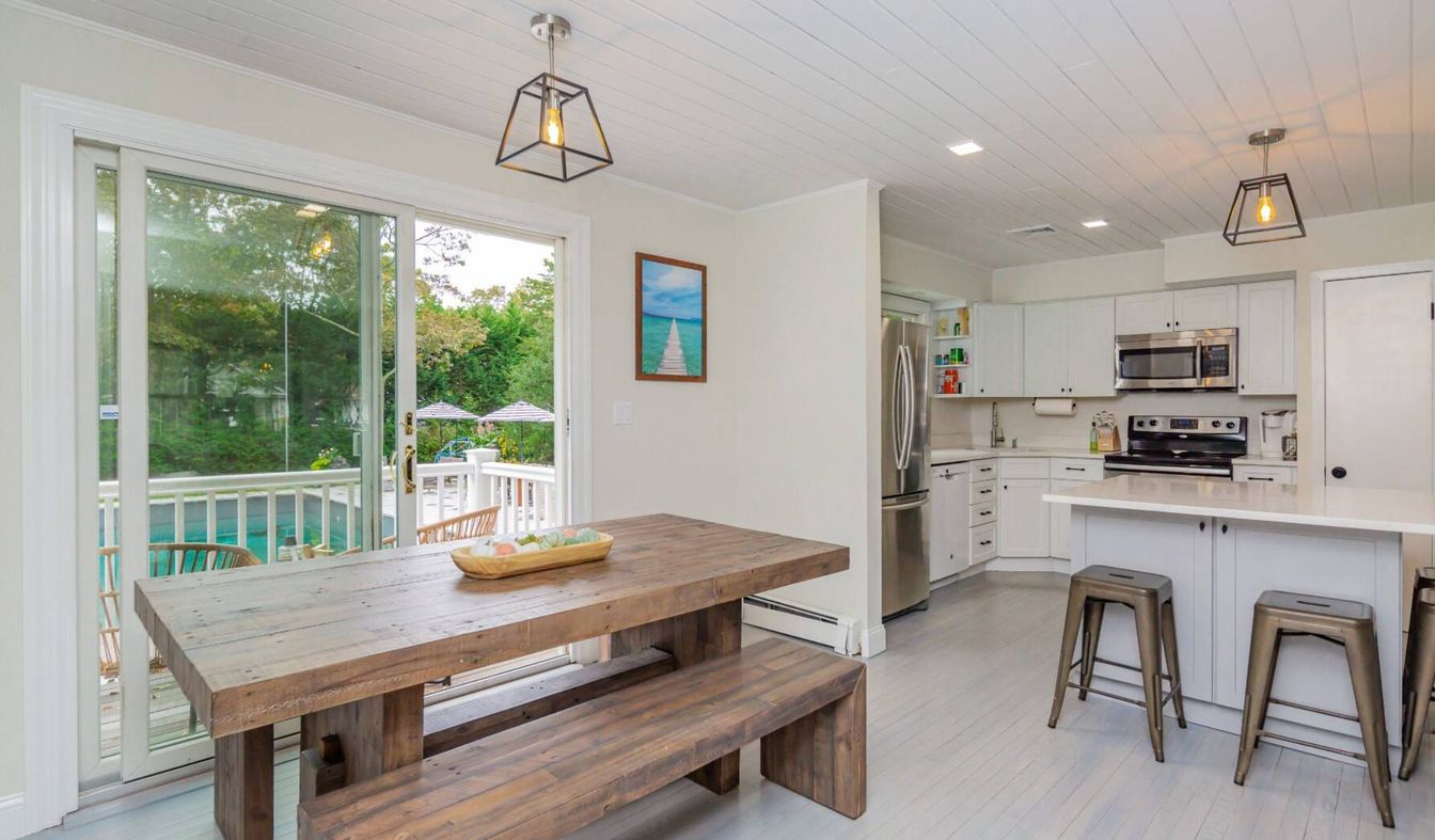 Dining room, Interior, Kitchen, Pendant Lights, Recessed Lighting, Stainless Steel Appliances, Wood Texture Flooring
