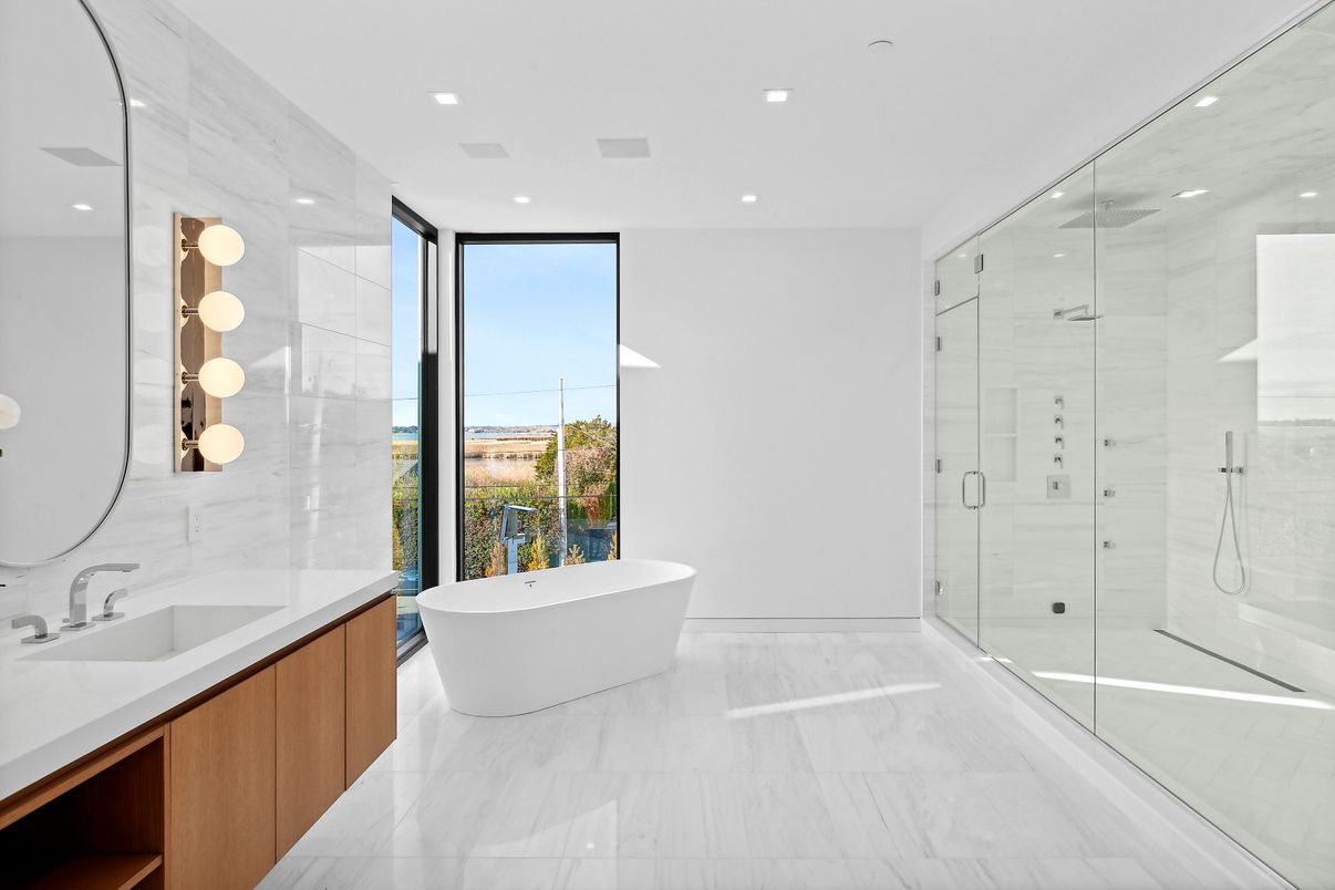 Bathroom, Dual Sink Vanities, Free Standing Baths, Glass Shower, Interior, Marble, Marble Walls, Recessed Lighting