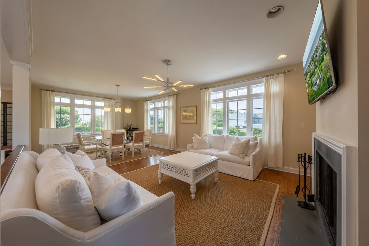Dining room, Fireplace, Interior, Living room, Pendant Lights, Recessed Lighting, Wood Texture Flooring