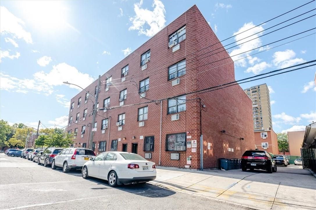 Exterior, Facade, Brick Facade, Condo Building