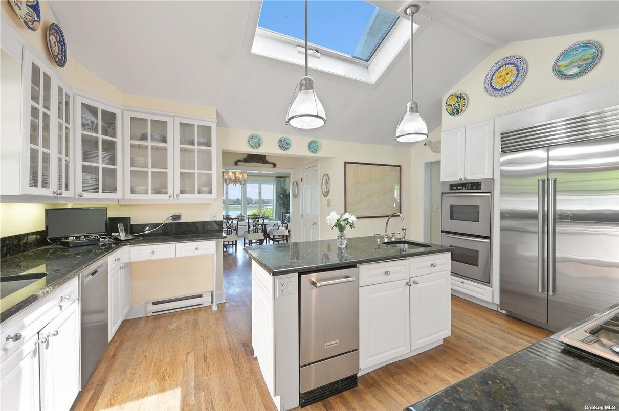 Dining room, Interior, Kitchen, Pendant Lights, Stainless Steel Appliances, Wood Texture Flooring