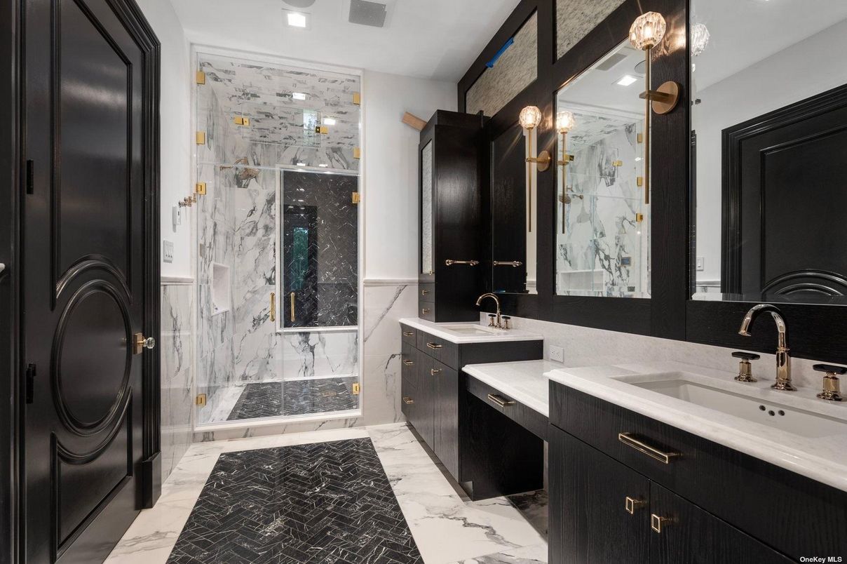 Bathroom, Dual Sink Vanities, Glass Shower, Interior, Marble, Marble Walls, Recessed Lighting