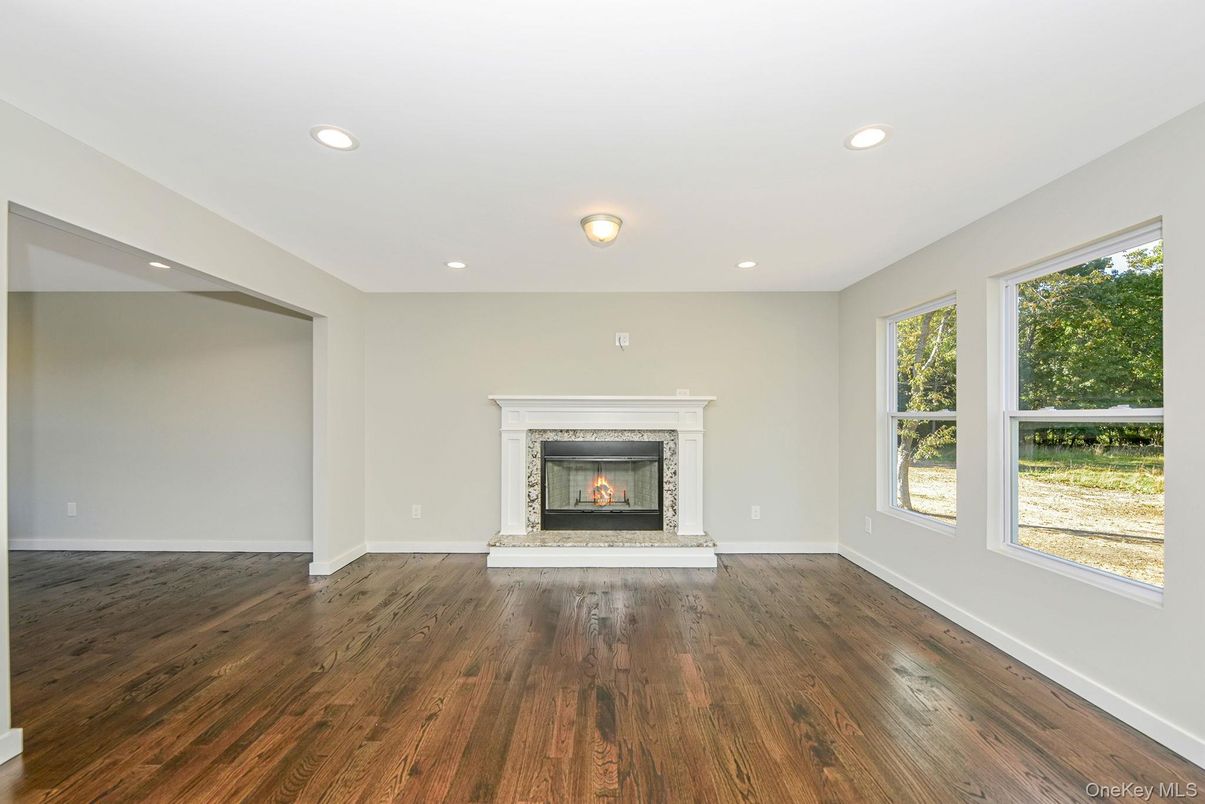 Empty room, Fireplace, Interior, Recessed Lighting, Wood Texture Flooring