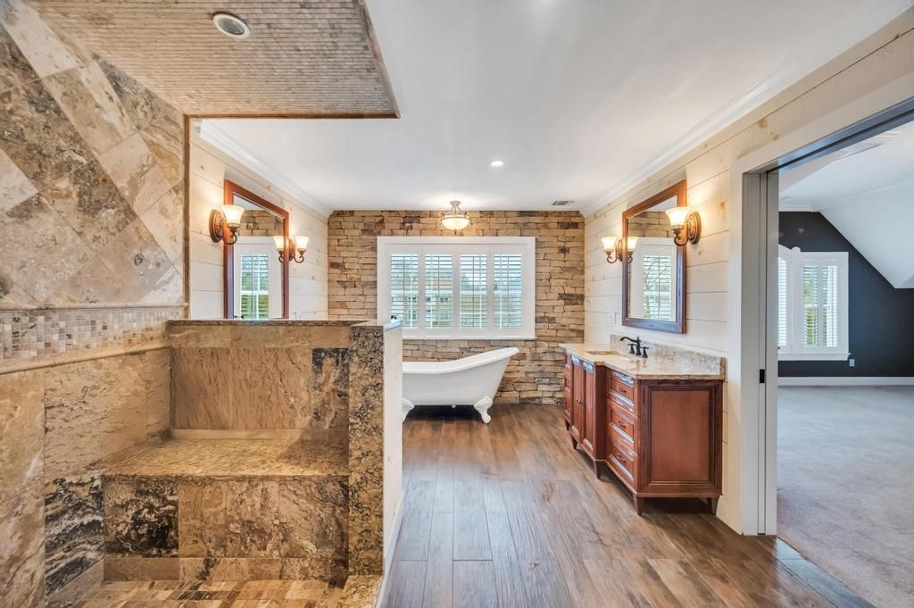 Bathroom, Dual Sink Vanities, Free Standing Baths, Interior, Recessed Lighting, Stone Walls, Wood Texture Flooring