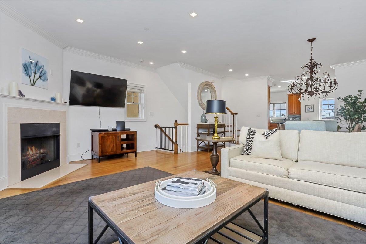Chandelier, Dining room, Fireplace, Interior, Living room, Recessed Lighting, Wood Texture Flooring