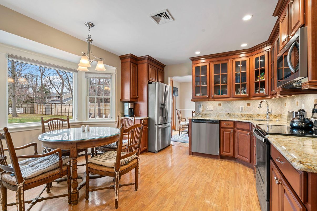 Dining room, Interior, Kitchen, Pendant Lights, Recessed Lighting, Stainless Steel Appliances, Wood Texture Flooring