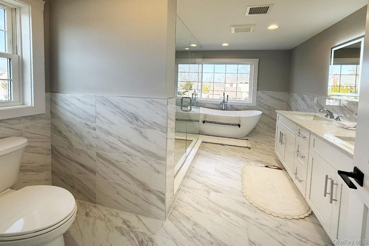 Bathroom, Free Standing Baths, Glass Shower, Interior, Marble, Marble Walls, Recessed Lighting