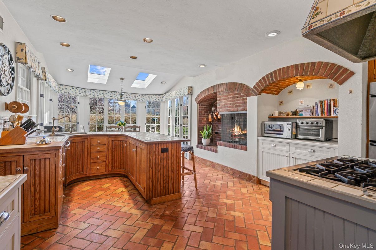 Fireplace, Interior, Kitchen, Pendant Lights, Recessed Lighting, Stone Walls