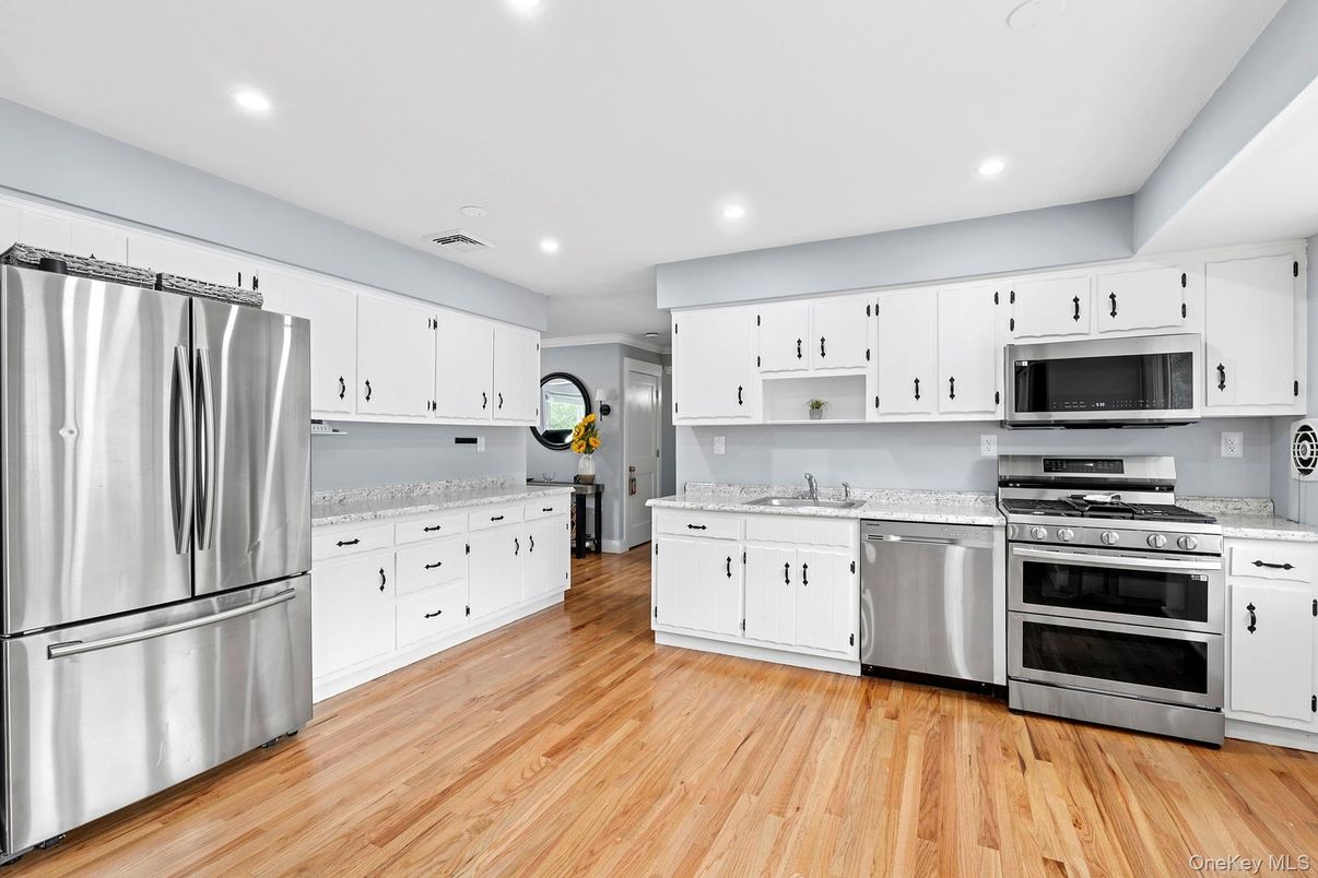 Interior, Kitchen, Recessed Lighting, Stainless Steel Appliances, Wood Texture Flooring