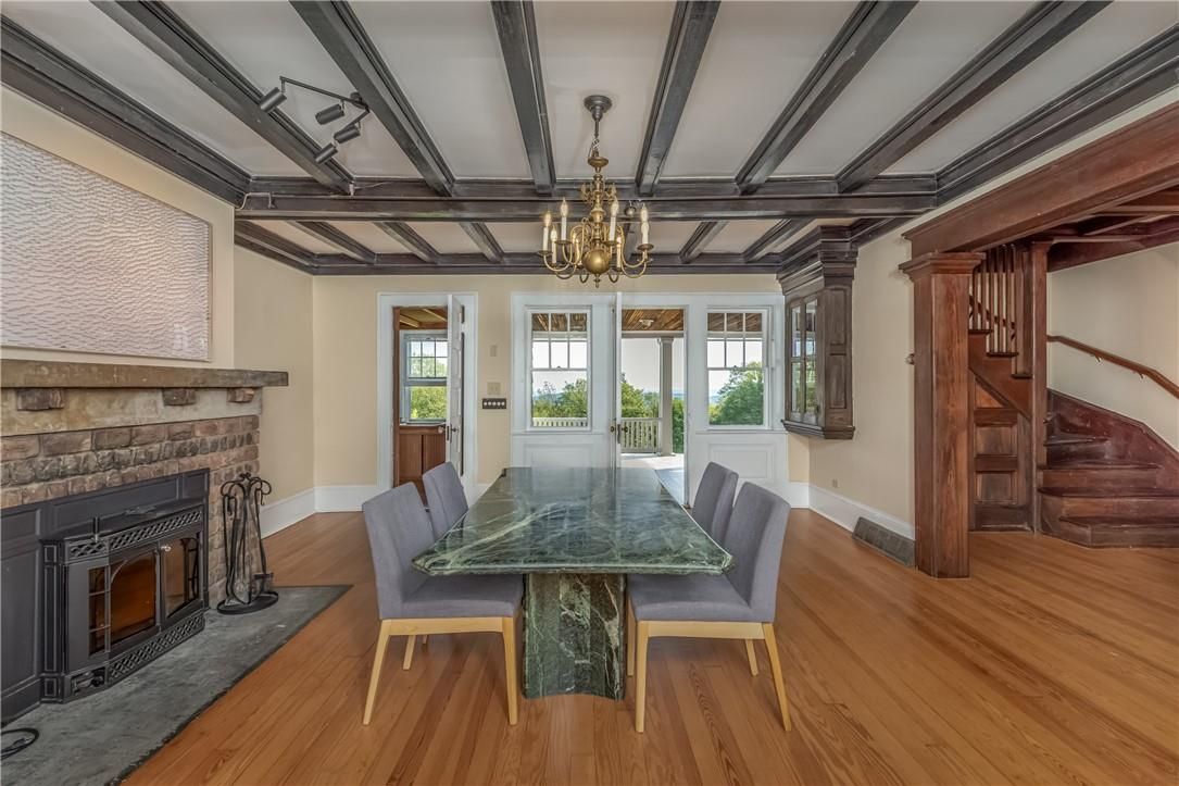 Chandelier, Dining room, Fireplace, Interior, Wooden Beams, Wood Texture Flooring