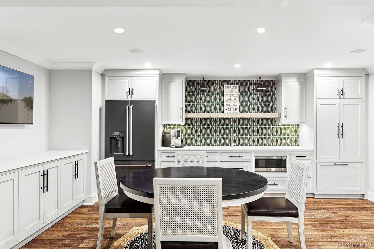 Dining room, Interior, Kitchen, Recessed Lighting, Stainless Steel Appliances, Wood Texture Flooring