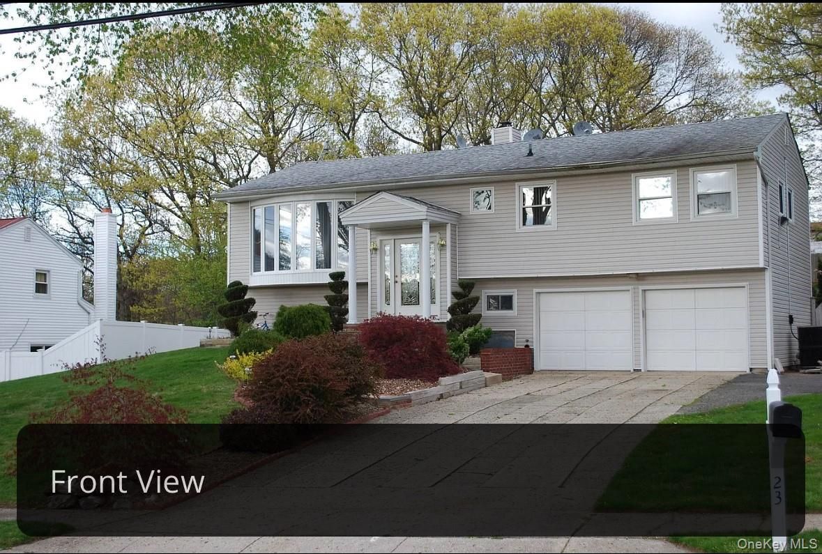 Attached, Exterior, Facade, Raised Ranch