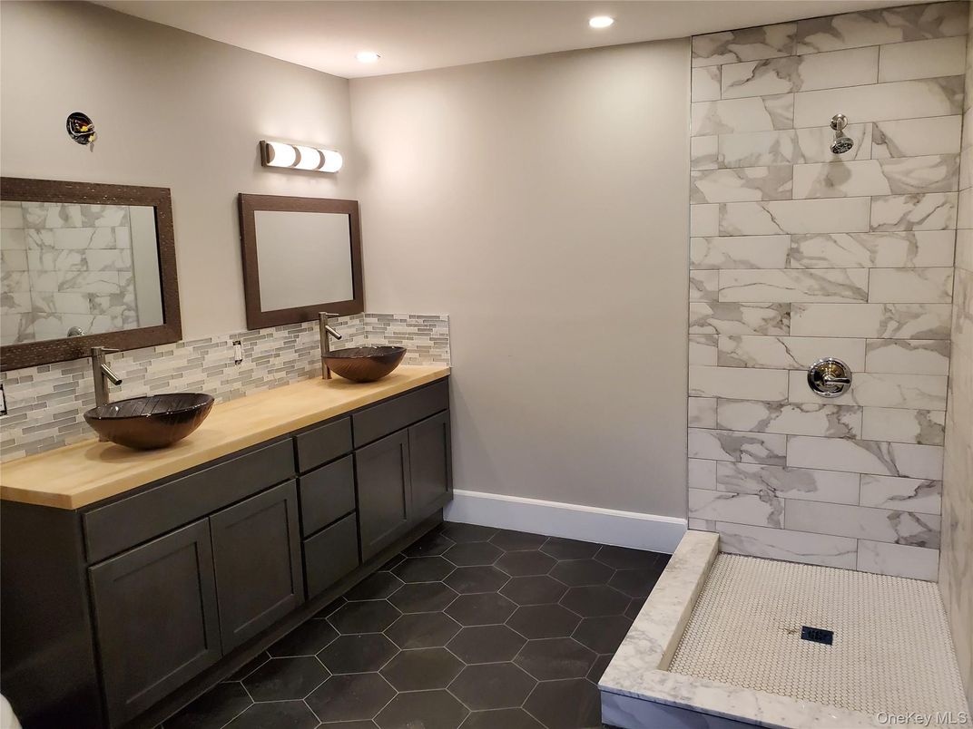 Bathroom, Dual Sink Vanities, Interior, Marble Walls, Recessed Lighting