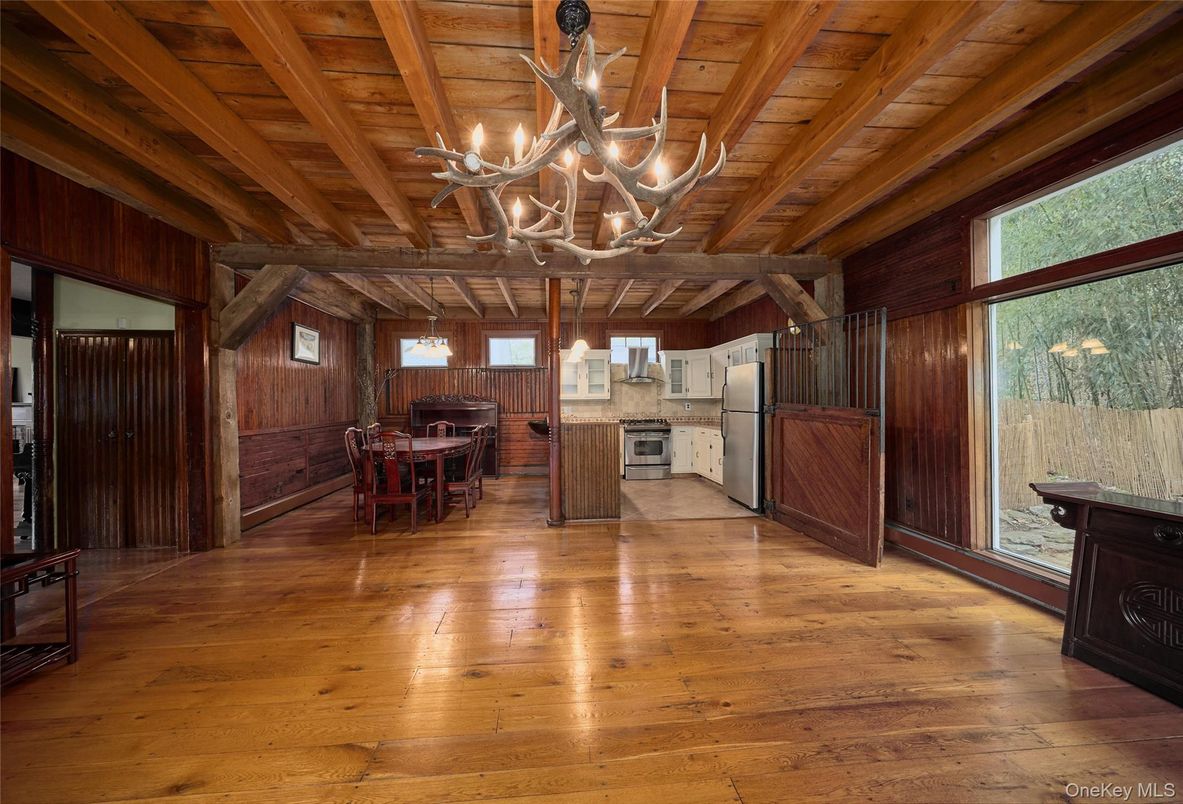 Chandelier, Dining room, Fireplace, Interior, Wooden Beams, Wooden Ceilings, Wood Texture Flooring, Wooden Walls