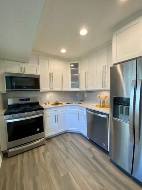 Interior, Kitchen, Recessed Lighting, Stainless Steel Appliances, Wood Texture Flooring