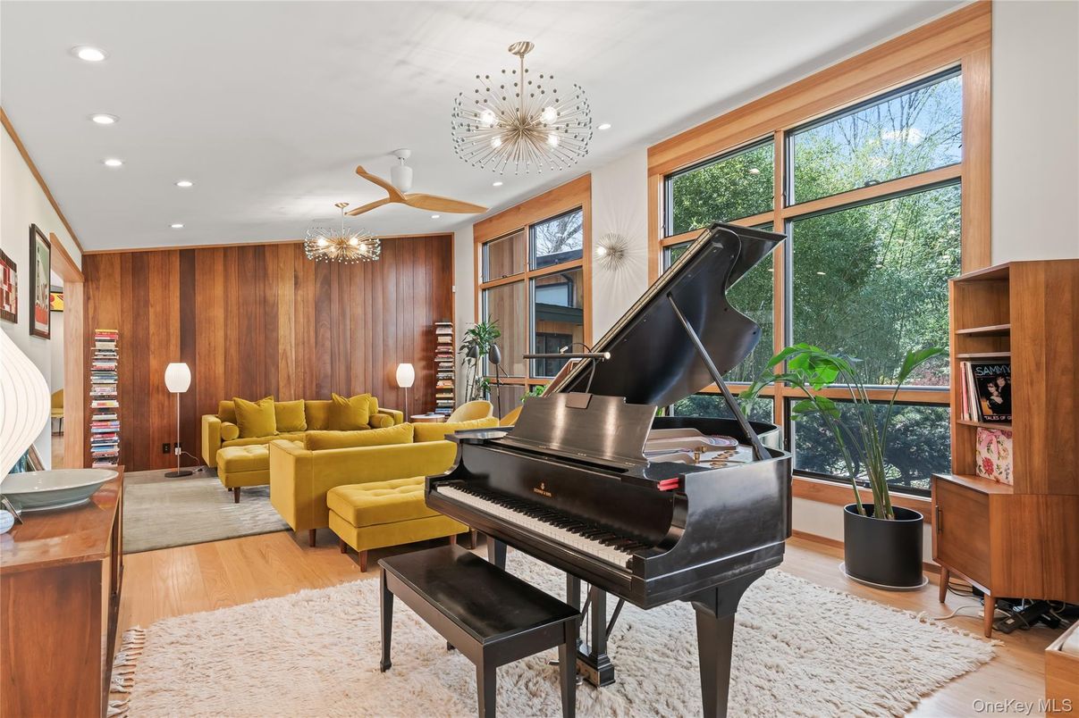 Chandelier, Interior, Living room, Piano, Recessed Lighting, Wood Texture Flooring, Wooden Walls