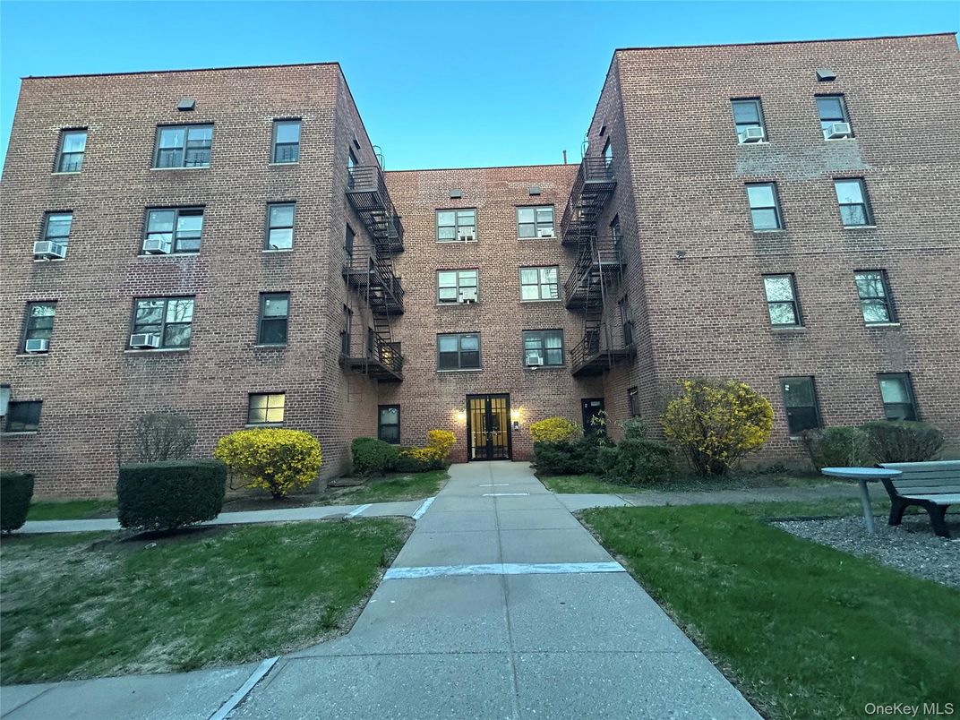 Exterior, Facade, Brick Facade, Condo Building