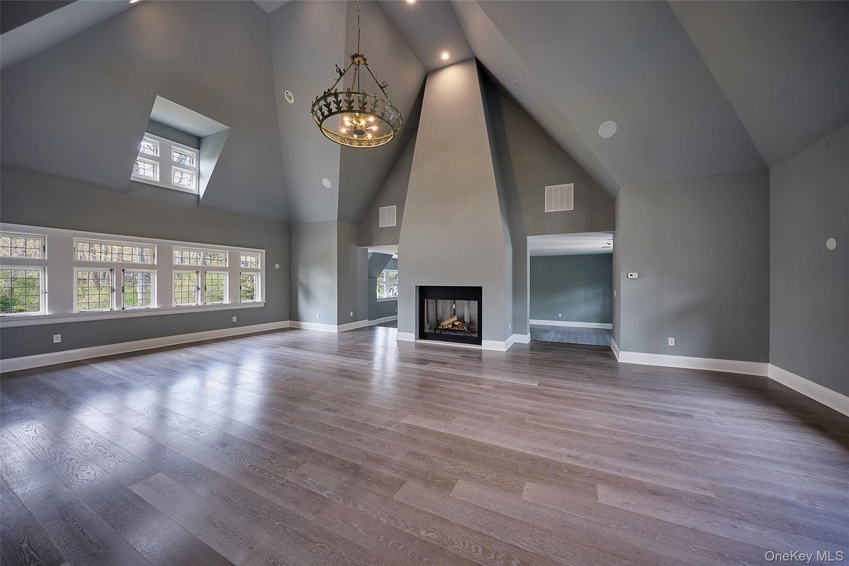 Empty room, Fireplace, Interior, Pendant Lights, Recessed Lighting, Wood Texture Flooring