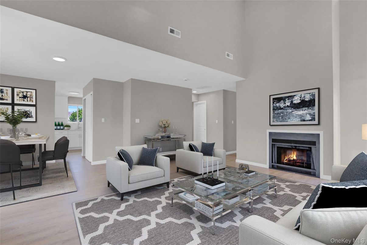 Dining room, Fireplace, Interior, Living room, Recessed Lighting, Wood Texture Flooring