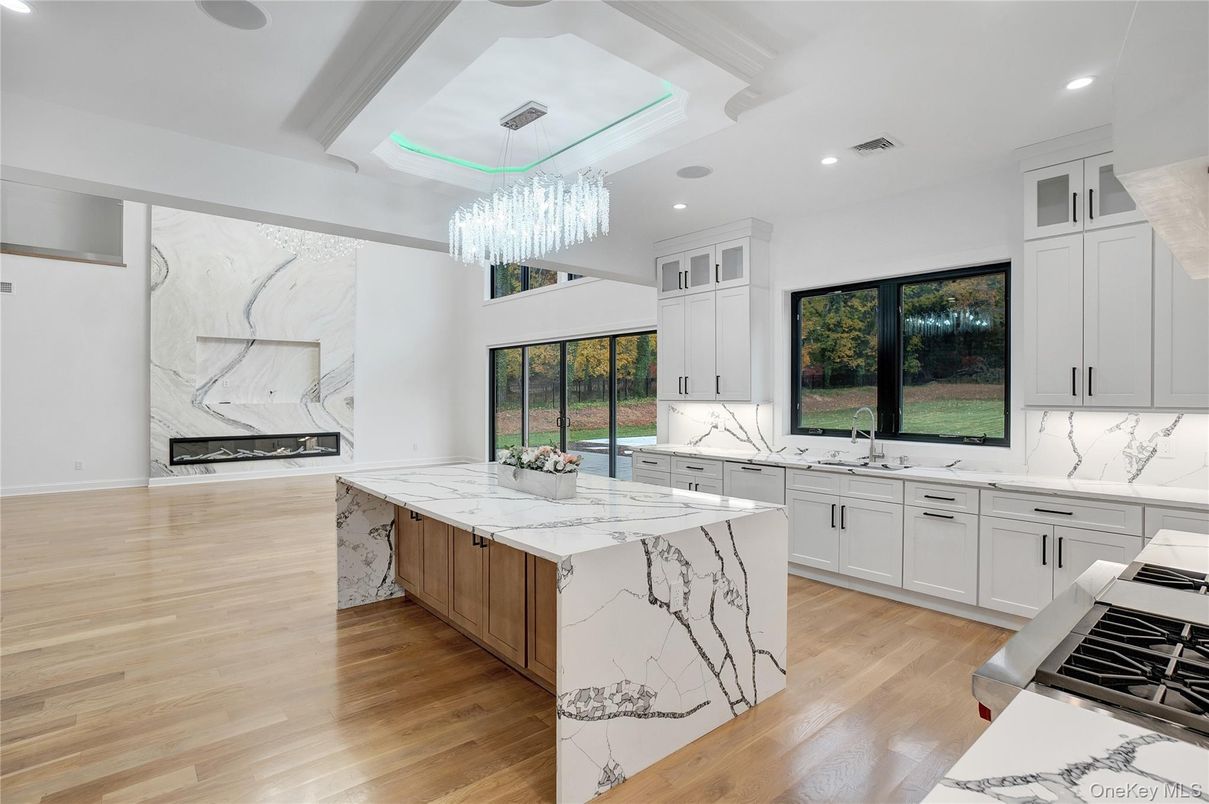 Chandelier, Interior, Kitchen, Marble Walls, Recessed Lighting, Wood Texture Flooring