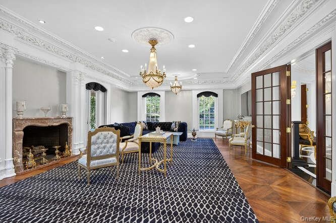 Chandelier, Fireplace, Interior, Living room, Recessed Lighting, Wood Texture Flooring