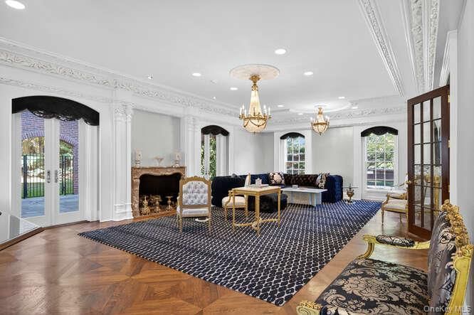 Chandelier, Fireplace, Interior, Living room, Recessed Lighting, Wood Texture Flooring