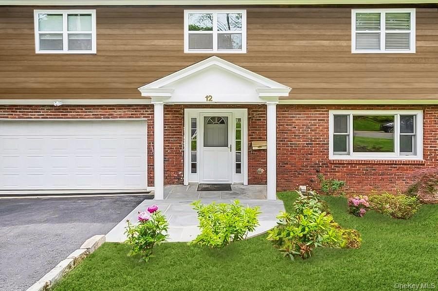 Attached, Exterior, Facade, Brick Facade, None