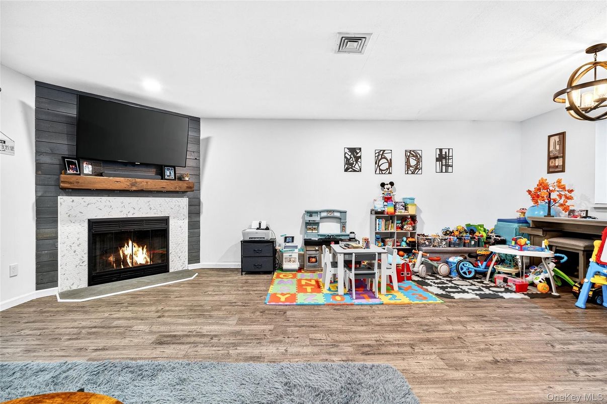 Fireplace, Interior, Pendant Lights, Recessed Lighting, Wood Texture Flooring